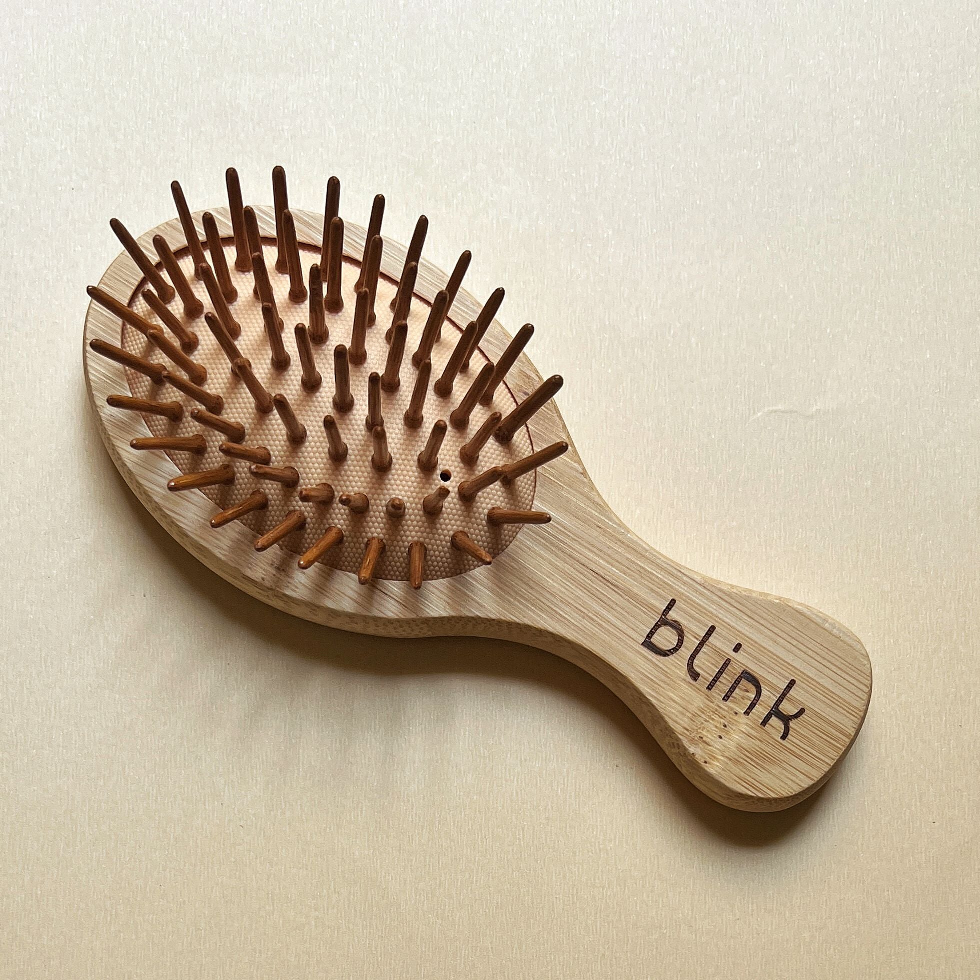 Blink Small Wooden Cushion Comb